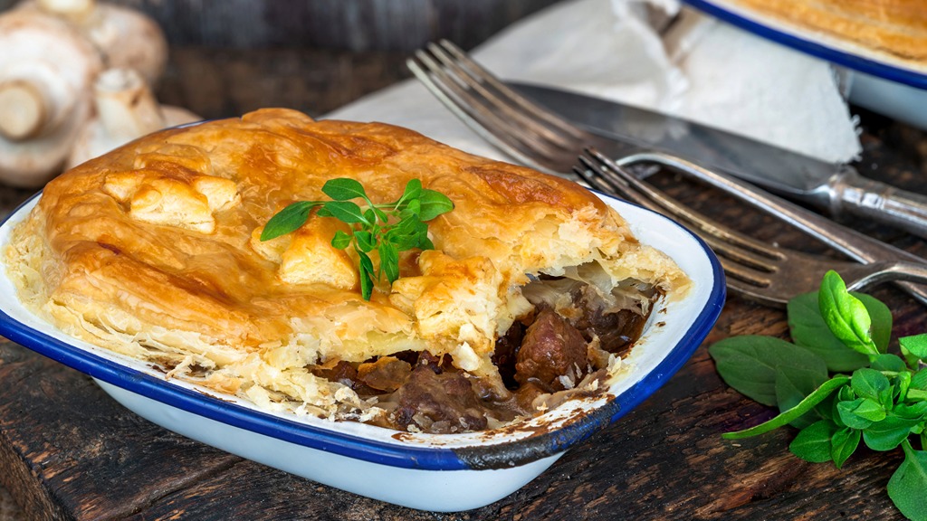 ceramic dish with home cooked meat pie